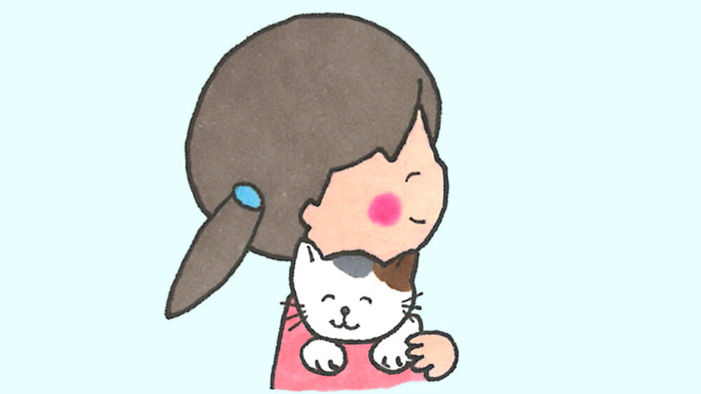 猫を抱く女の子